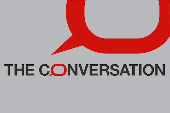 "The Conversation" in black text on gray background with red outlined speech bubble