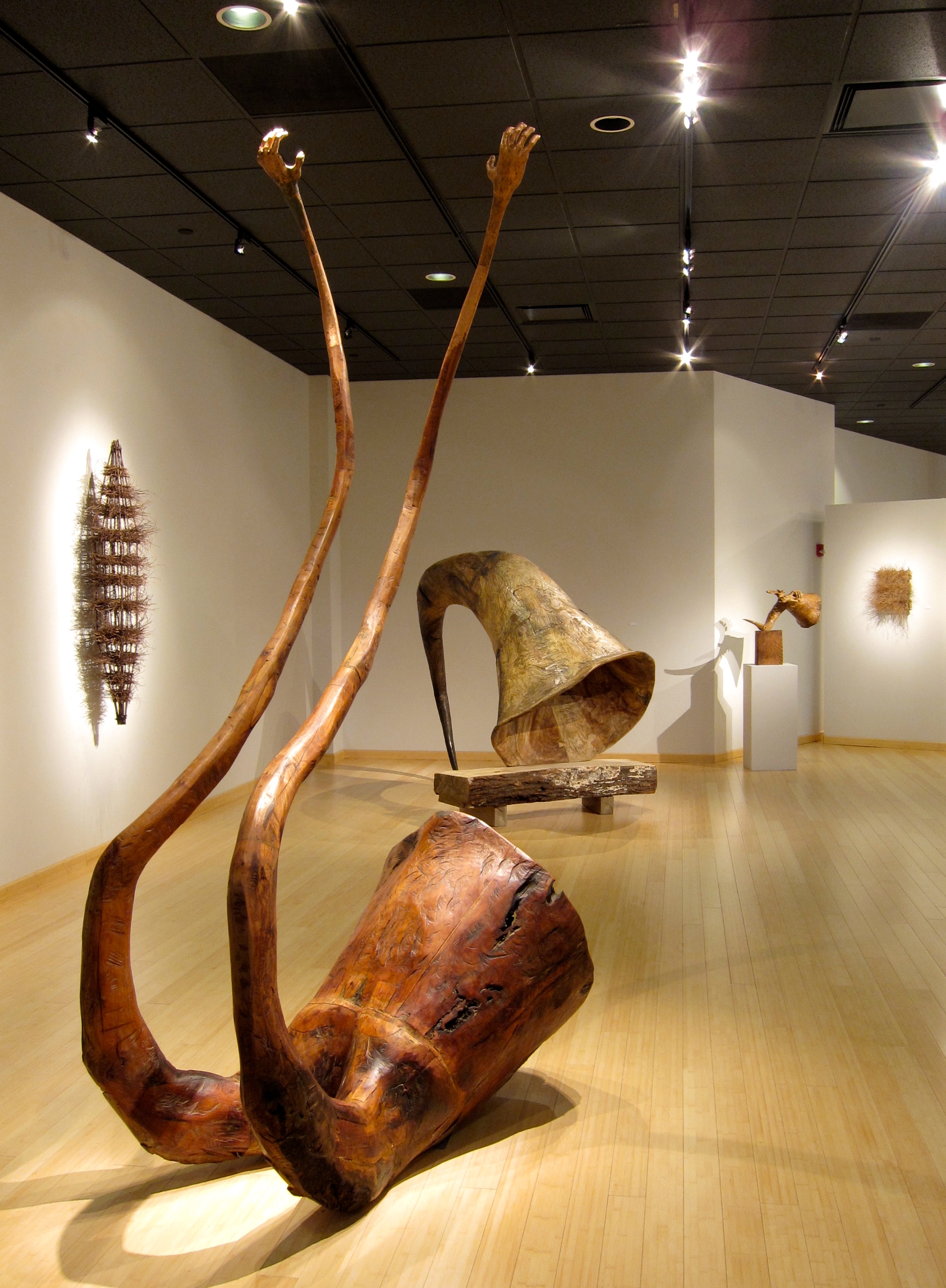Rear view of one of Wolff's pieces, which featues a horn like shape seperating into two tentacle like arms.