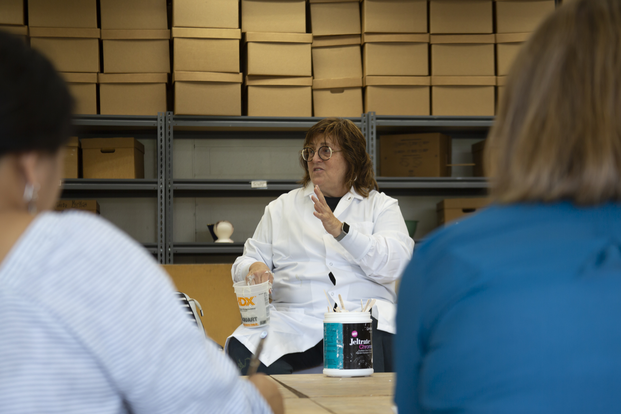 Joyce Hertszon, faculty member, instructs area high school teachers.