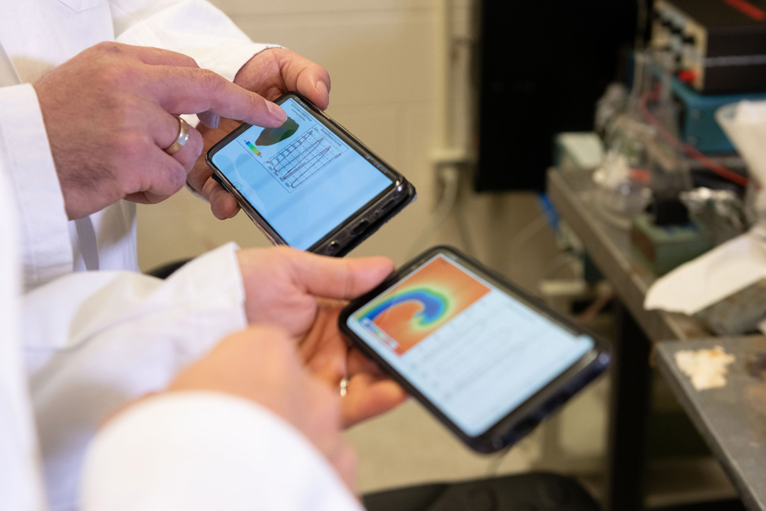 Two smartphone screens side-by-side showing graphs.