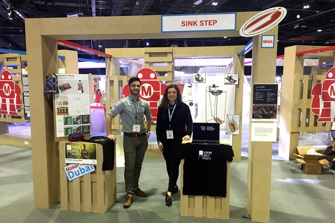Frank Barletta and Hannah Giancola post up at their booth at Dubai's Maker Faire.