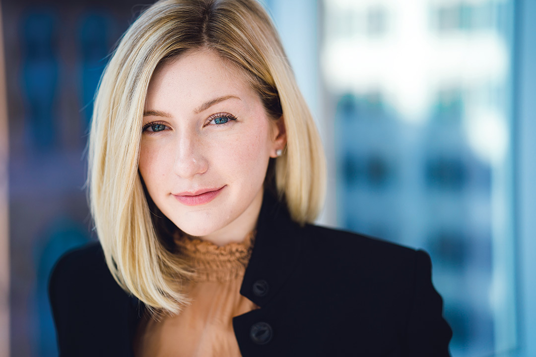 Head-and-shoulders view of woman wearing black blazer