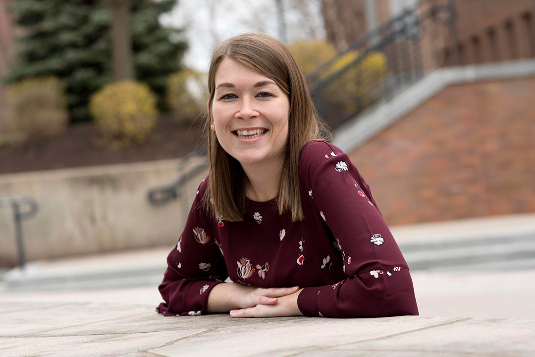 Woman poses on RIT campus.