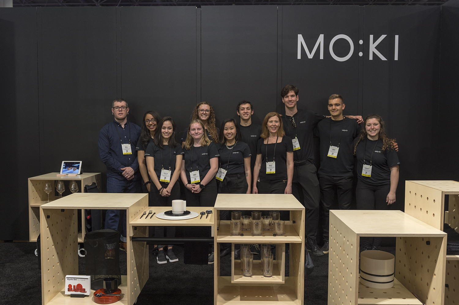 Students and faculty pose for a photo at the ICFF booth