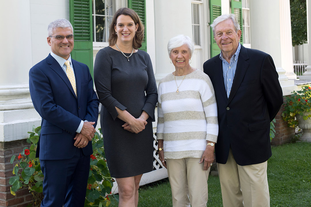 RIT Liberal Arts Dean James Winebrake, Genesee Country Village & Museum President and CEO Becky Wehle, and Anne and Phil Wehrheim meet at the museum.