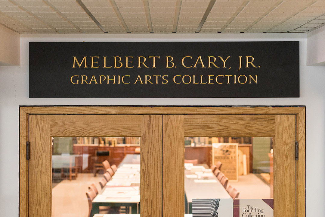 Inscription above glass doors with wood fram reads: Melbert B. Cary Jr. Graphic Arts Collection.