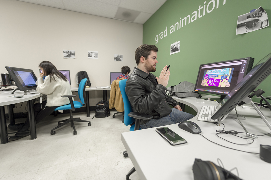 MFA in Film and Animation students work in the program's lab.