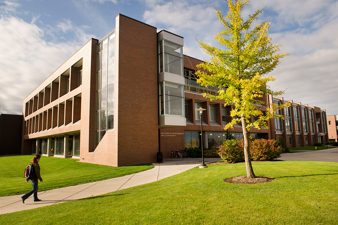 exterior view of brick and glass building.