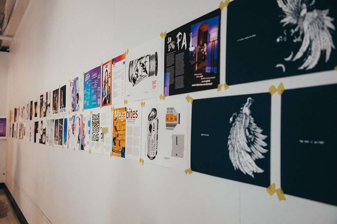 Ellipse 2019 spreads are displayed on a wall.