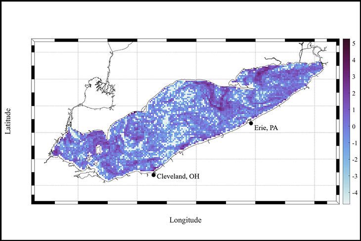 map of Lake Erie with blue dots representing concentrations of plastic pollution.