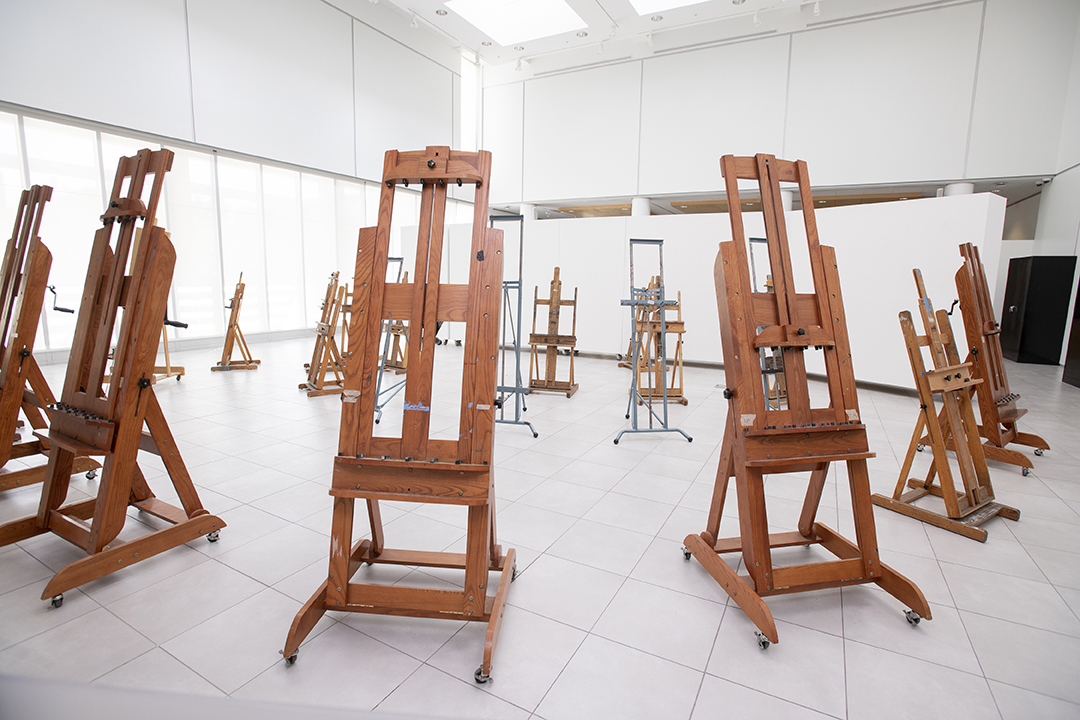 Easels are placed in University Gallery.