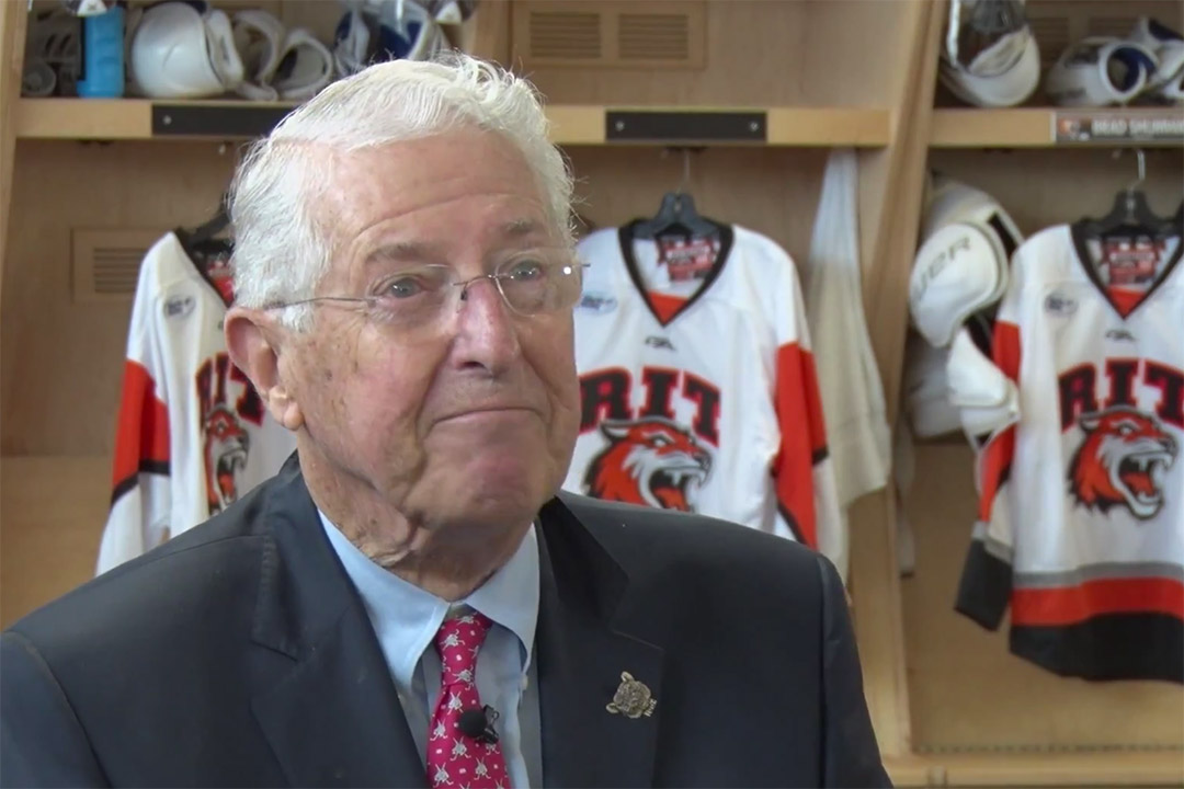 Bruce Bates in hockey locker room.