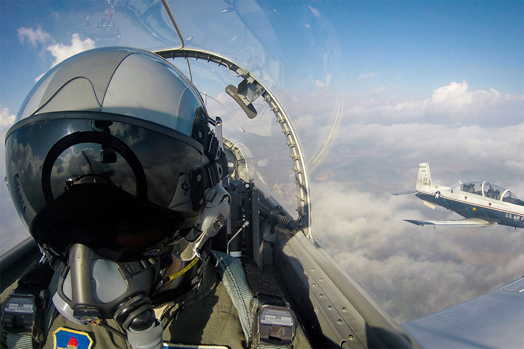Air Force cadet flying a jet.