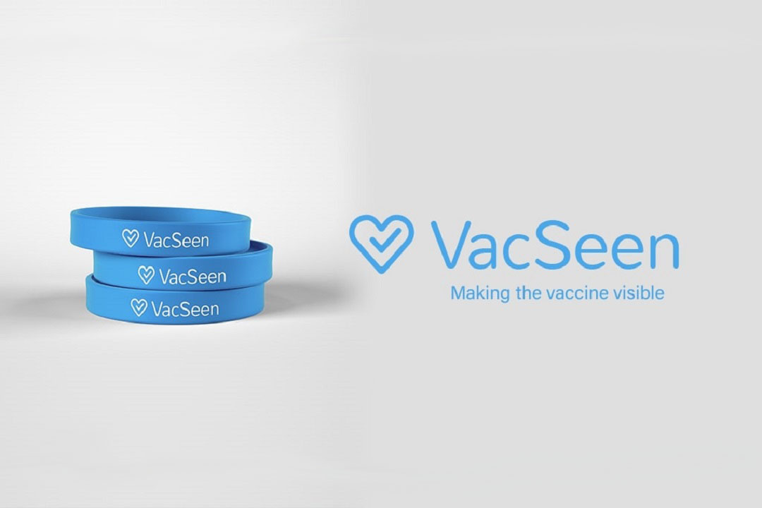 Three blue rubber bracelets with the writing "VacSeen." Logo for VacSeen Making the vaccine visible.
