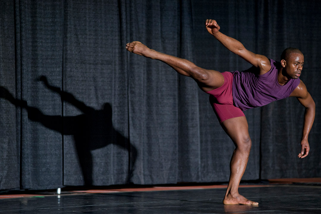 modern dancer alone on stage.