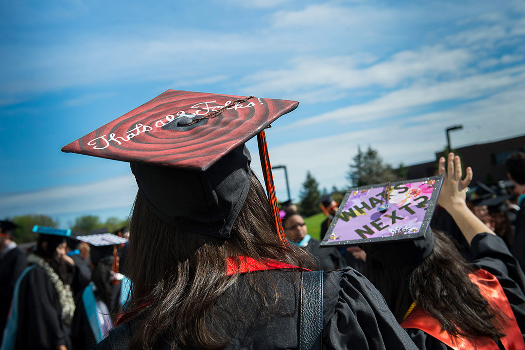 two students at a graduation.