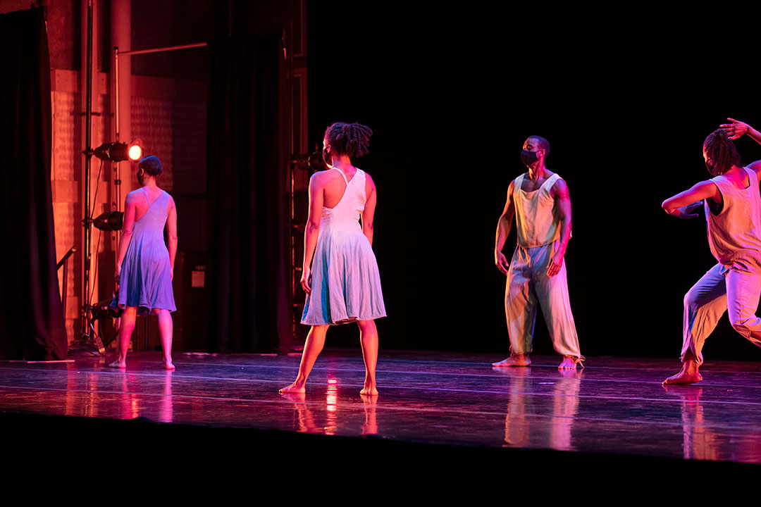 four dancers on stage.