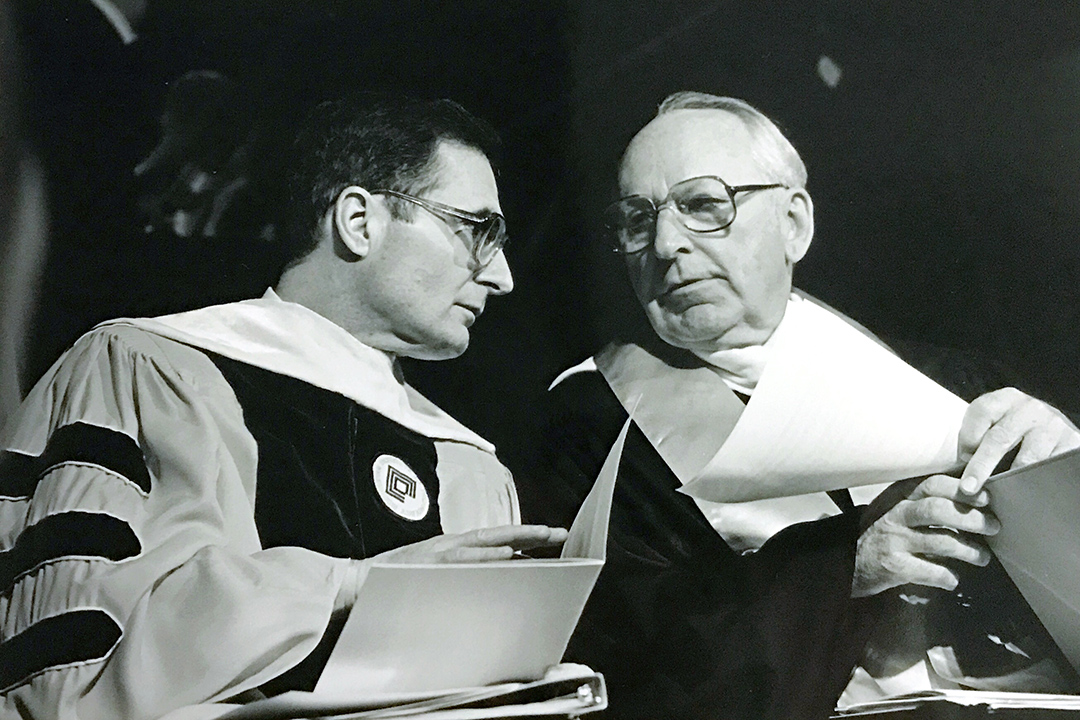 RIT president and trustee in graduation regalia in the 1980s.