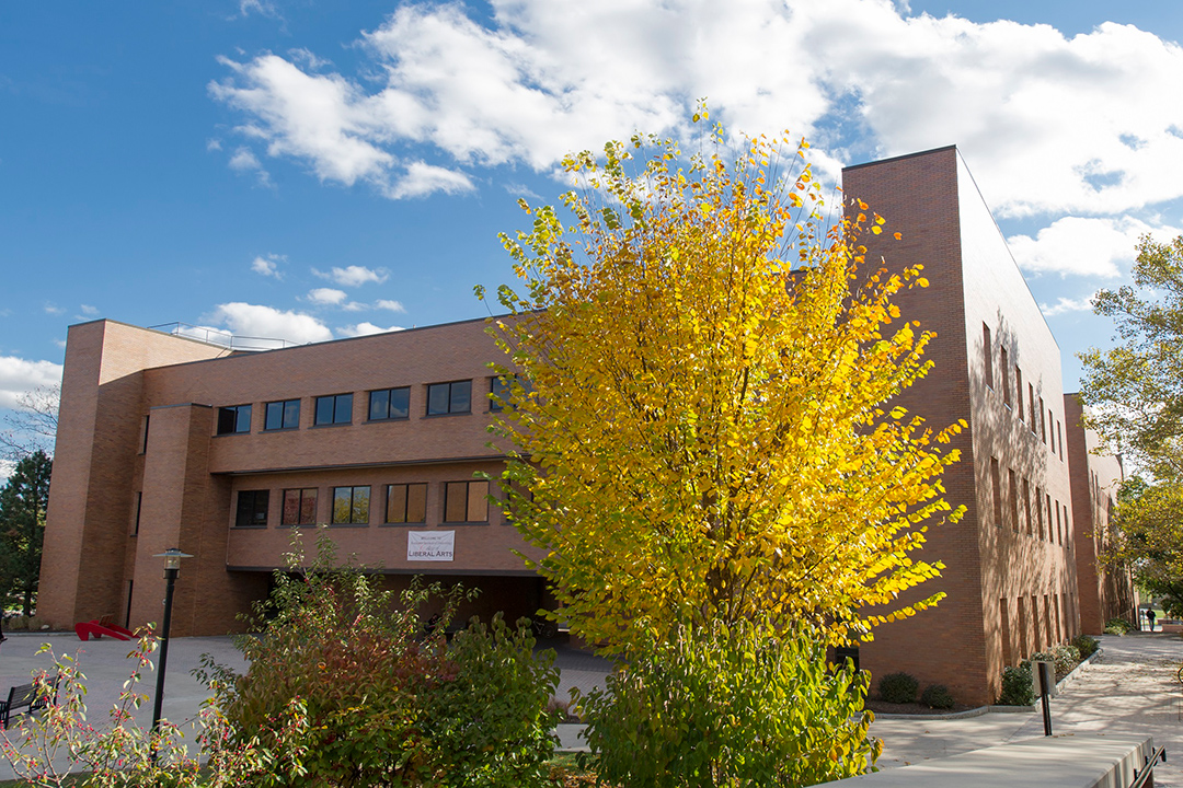 exterior view of three-story brick building.