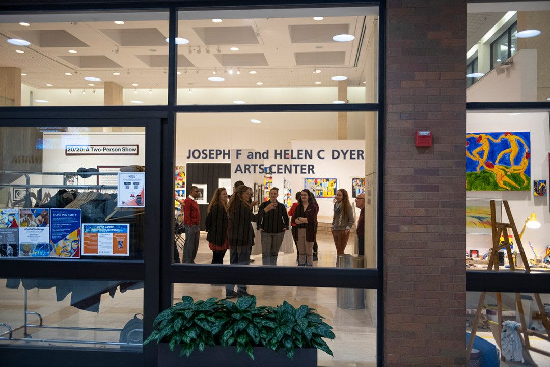 view from outside looking in an art gallery.