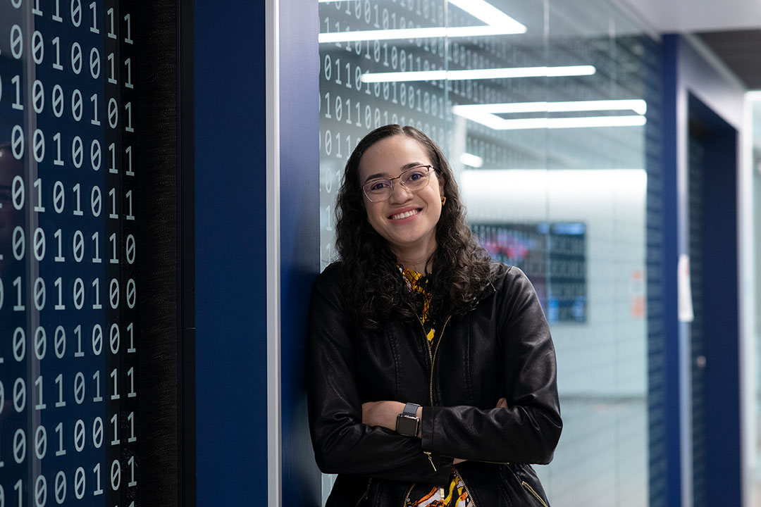 environmental portrait of student Joanna C. S. Santos.