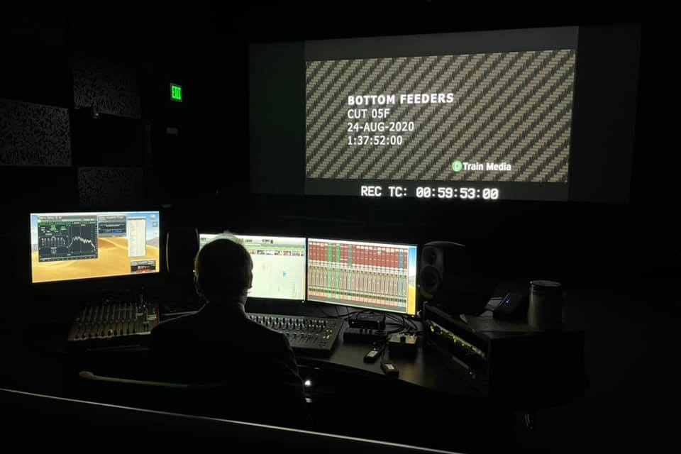 Dave Sluberski edits the sound for the film Bottom Feeders in the sound mixing theater in MAGIC Spell Studios.