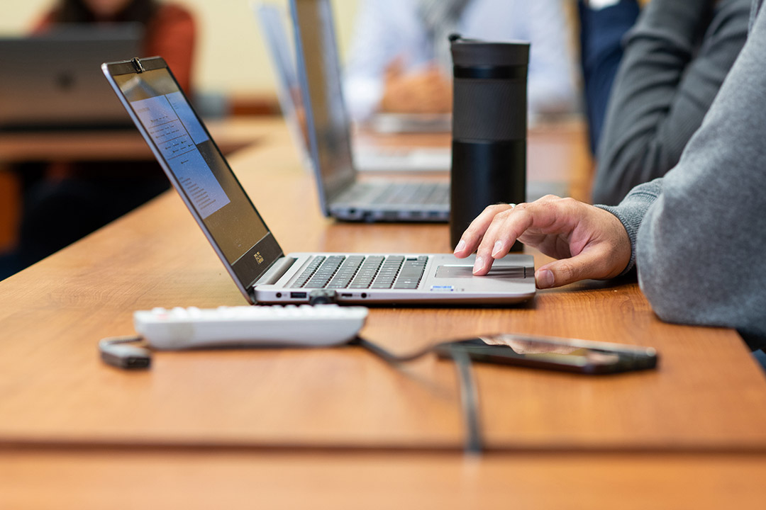 person using a laptop computer.