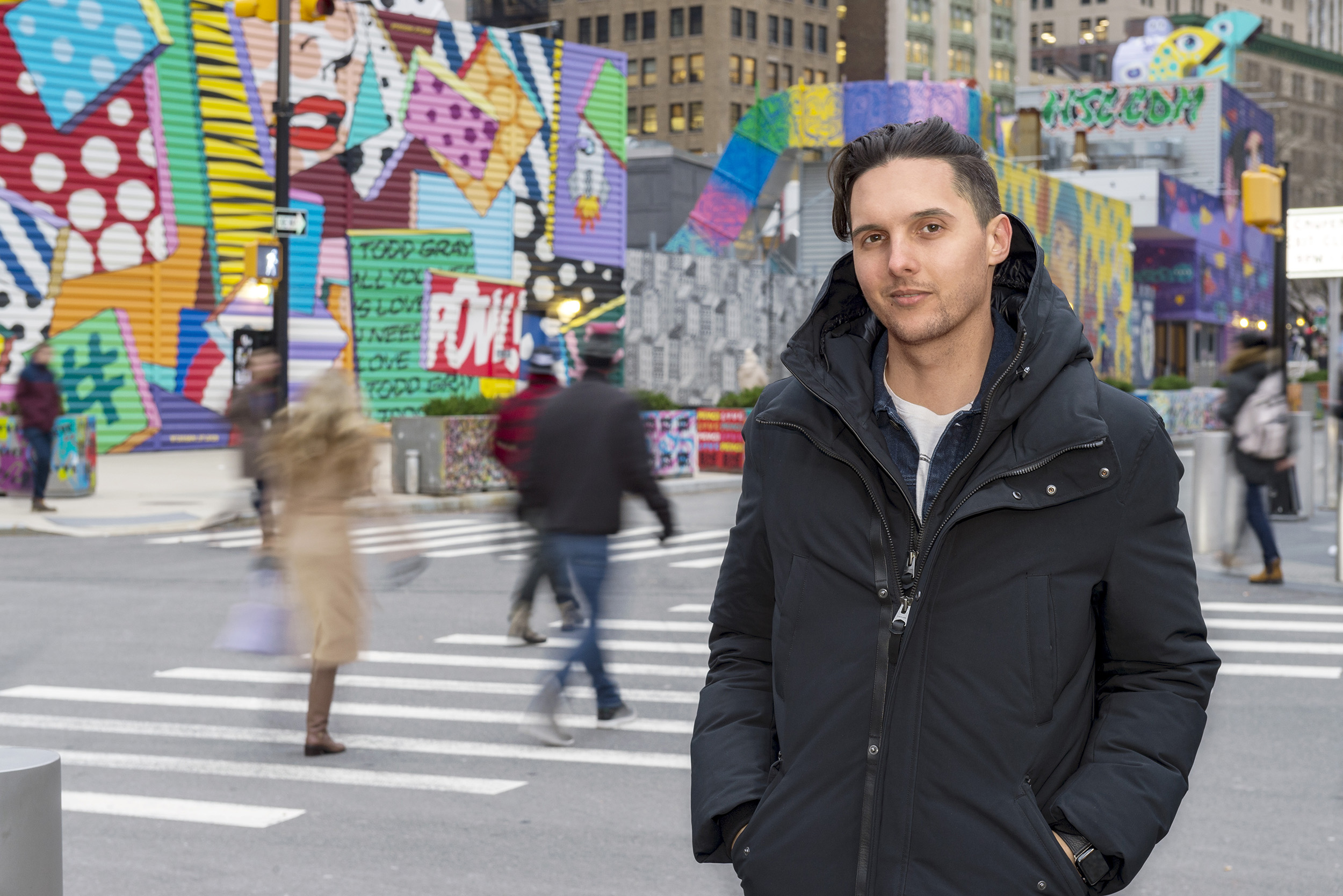 John Traver poses for a portrait outside in New York City.