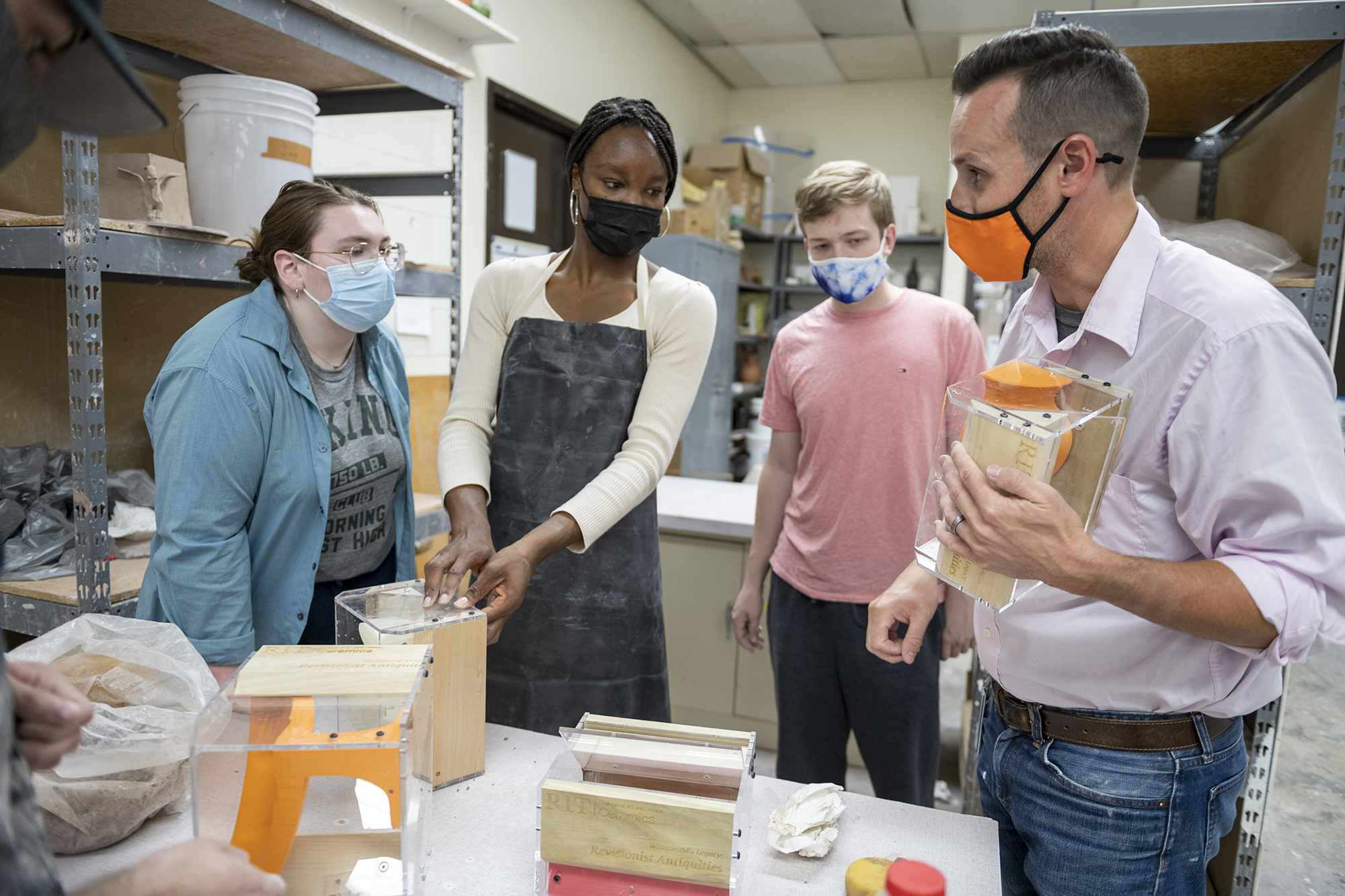 Peter Pincus teaches students how to make a mold.