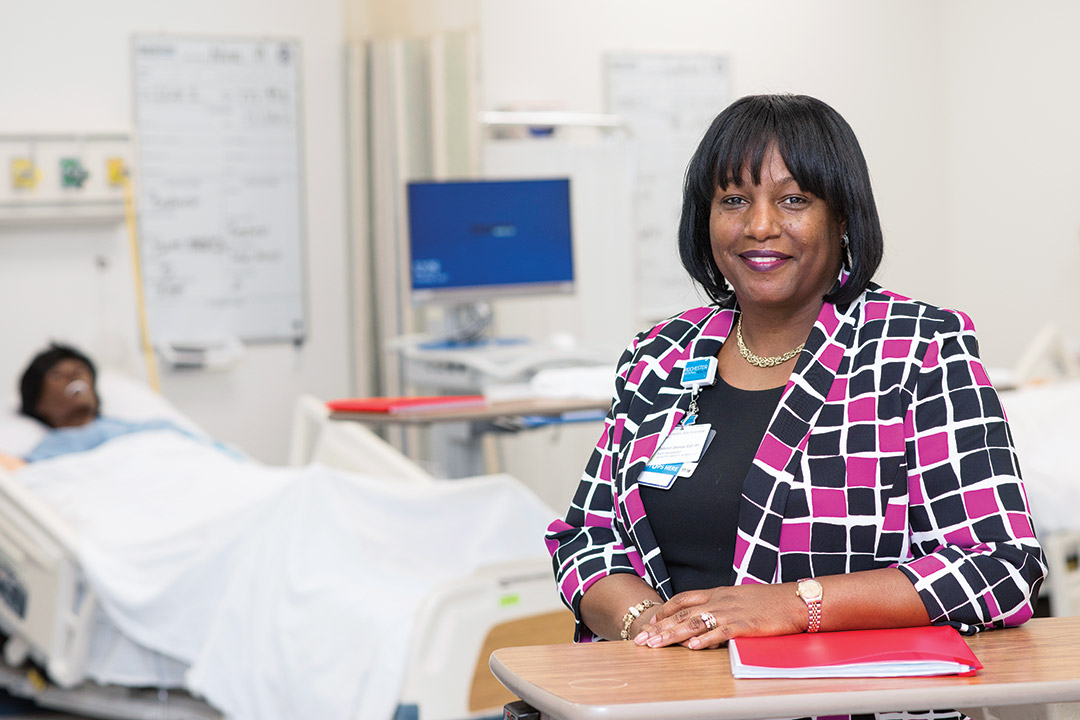 hospital administrator in a hospital room.