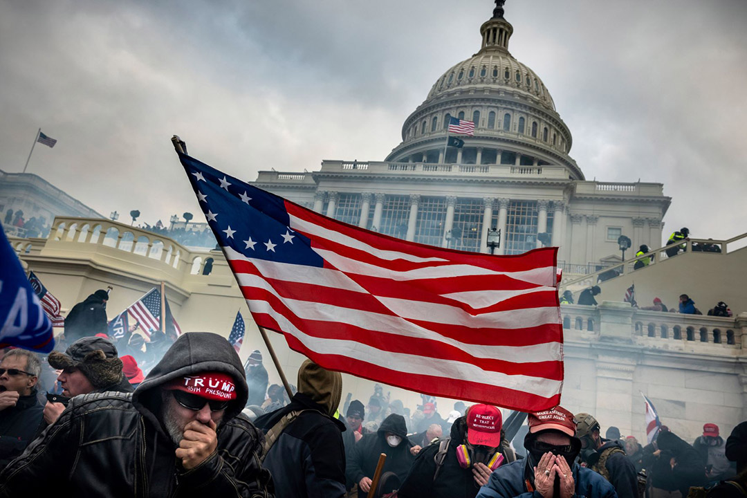 crowd of people in front of the U.S. Capitol building.