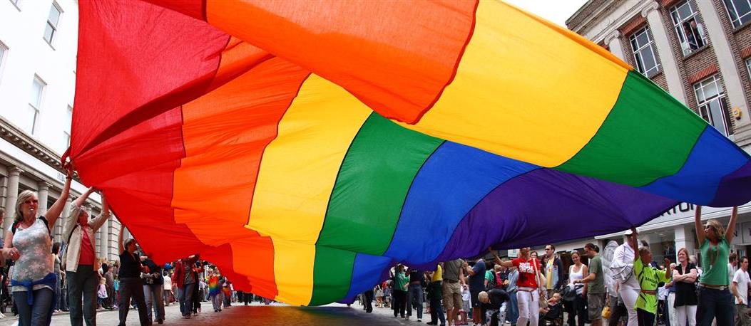 Rainbow flag banner at parade