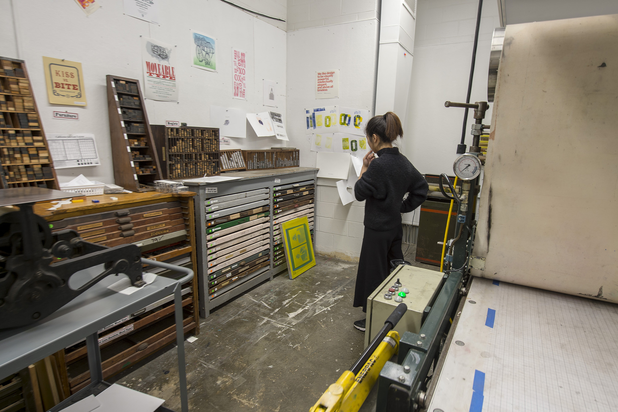 A student works in the printmaking studio.