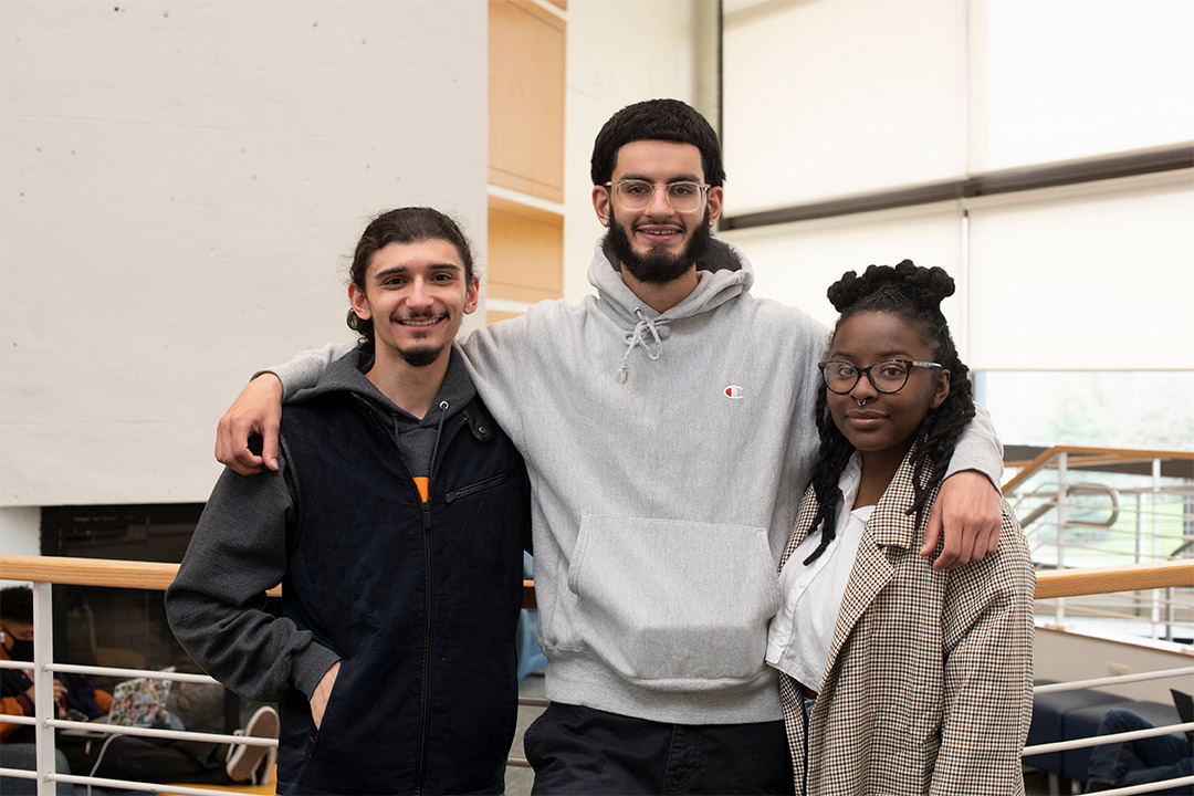 three students posing for a photo.