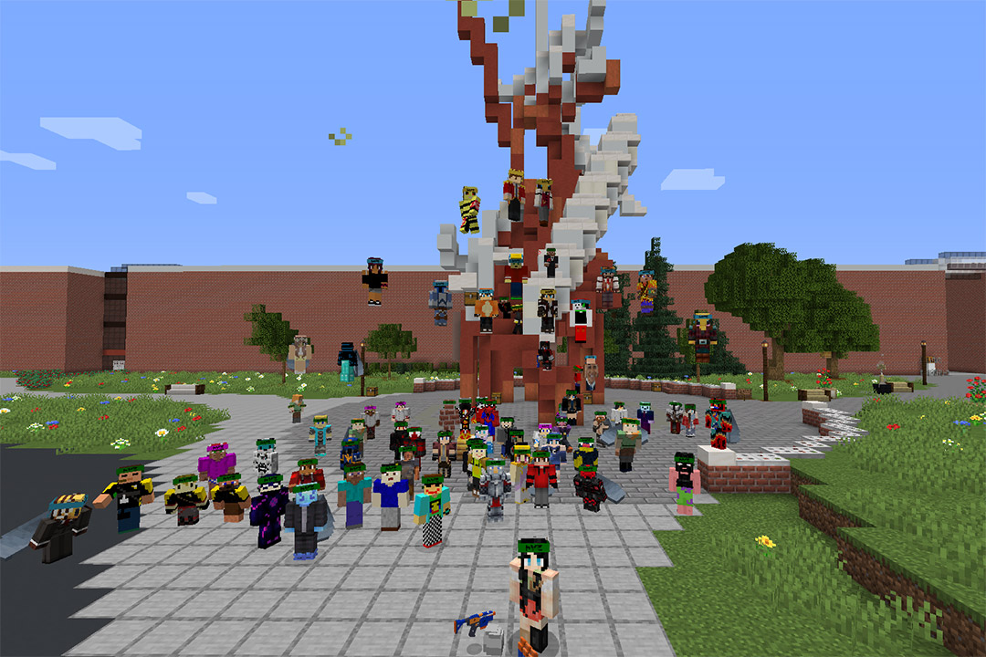 Minecraft characters standing around The Sentinel statue.