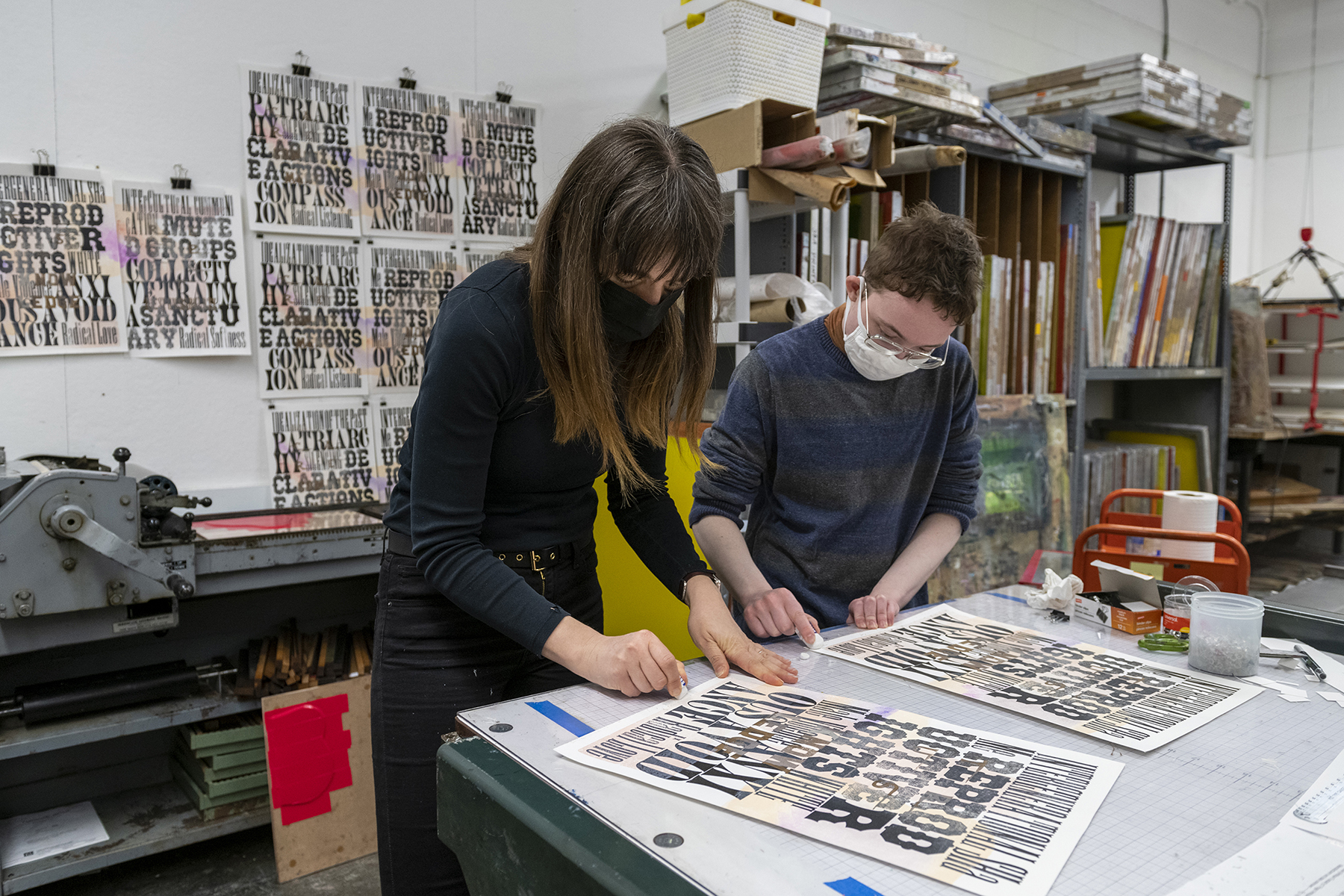 Vida Sacic and student Kirk Wu work on a print.