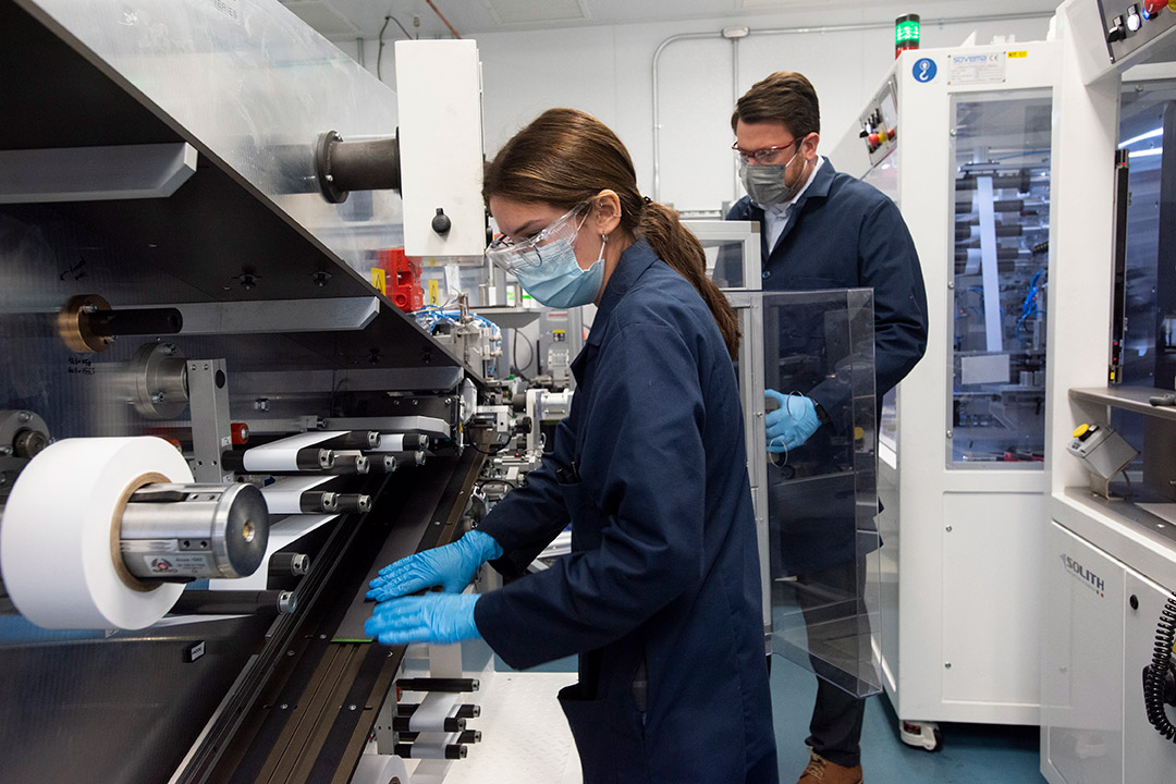 two people working in a lab.