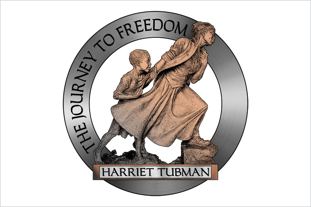 graphic showing an image of Harriet Tubman leading a child with the words The Journey to Freedom.