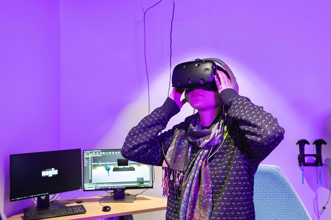 student wearing a virtual reality headset.