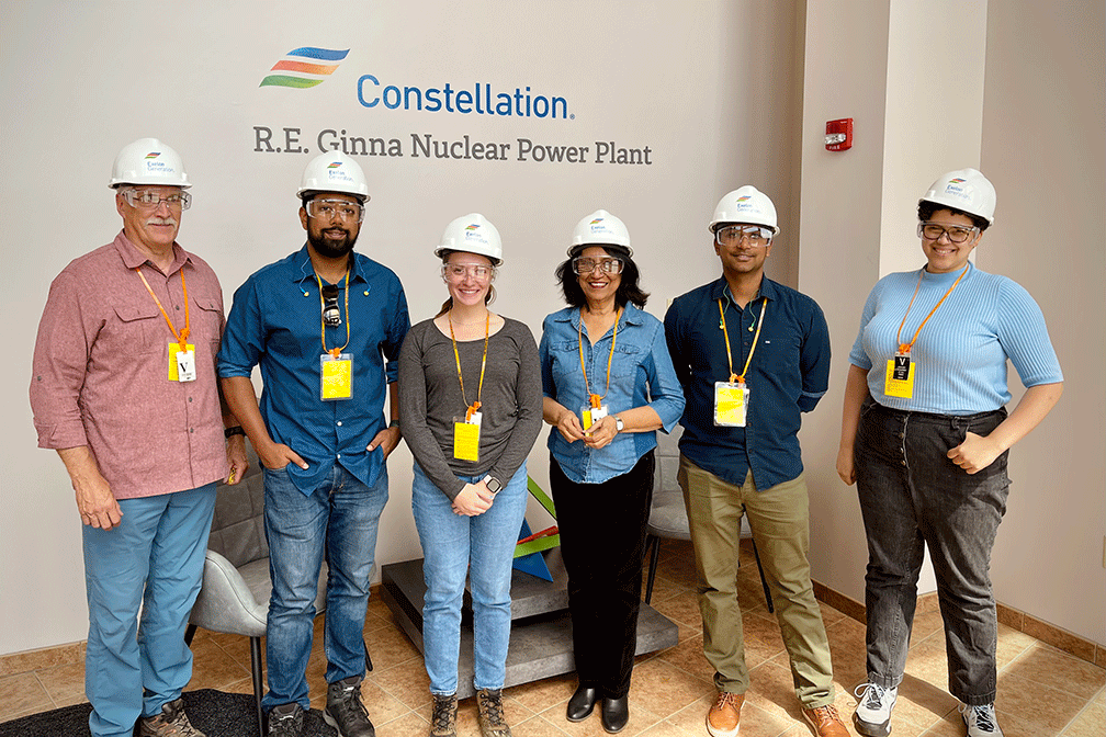 RIT engineering students and professors wearing hard hats at R.E. Ginna Nuclear Power Plant