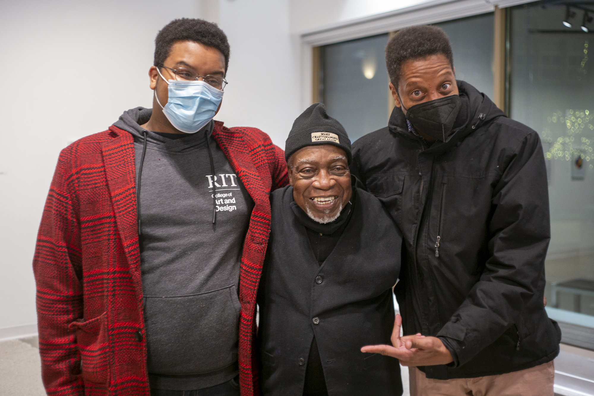 Unique Fair, Luvon Sheppard and Shawn Dunwoody pose for a group photo in RIT City Art Space.
