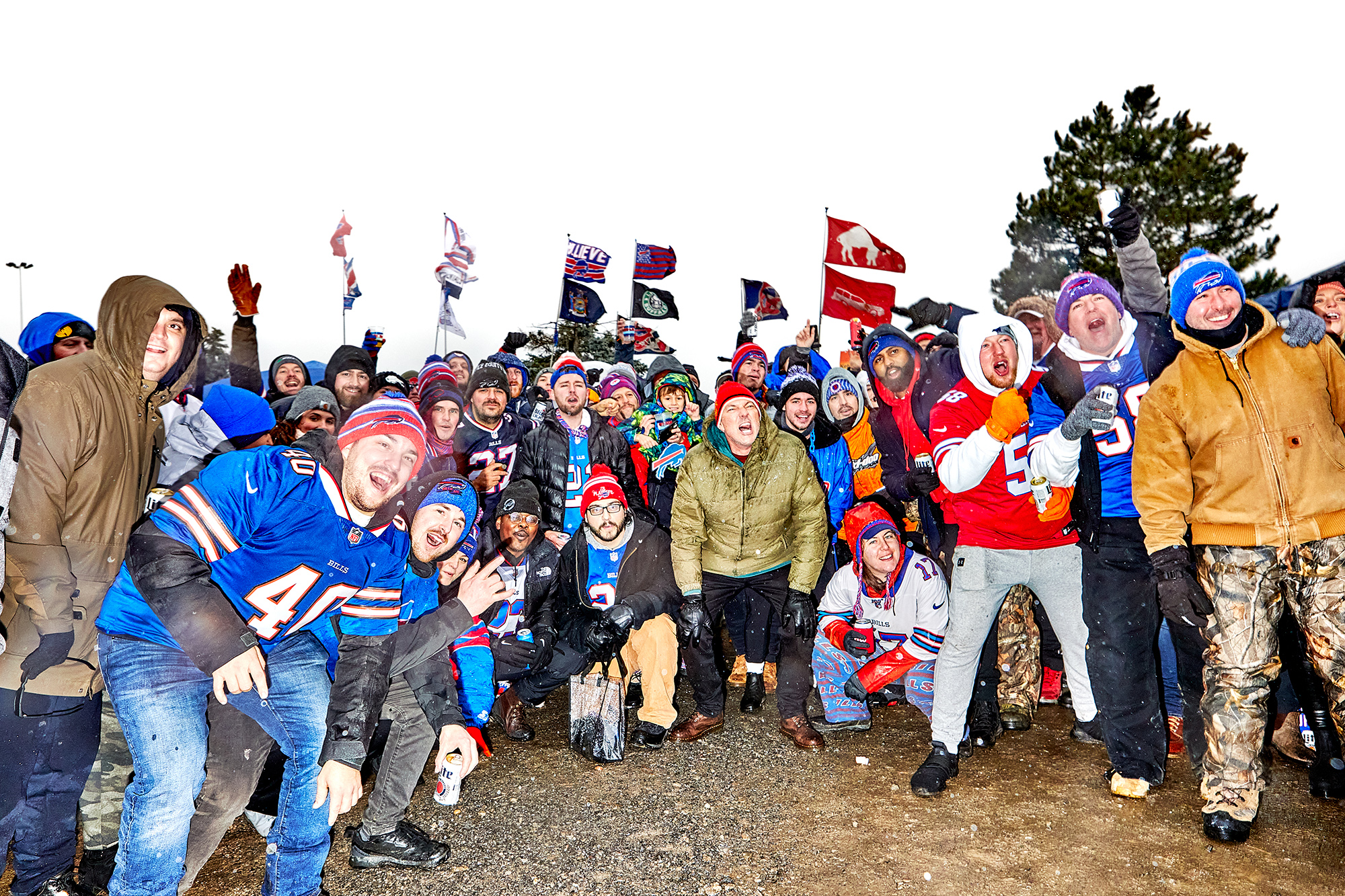 A group of Bills fans pose for a photo.