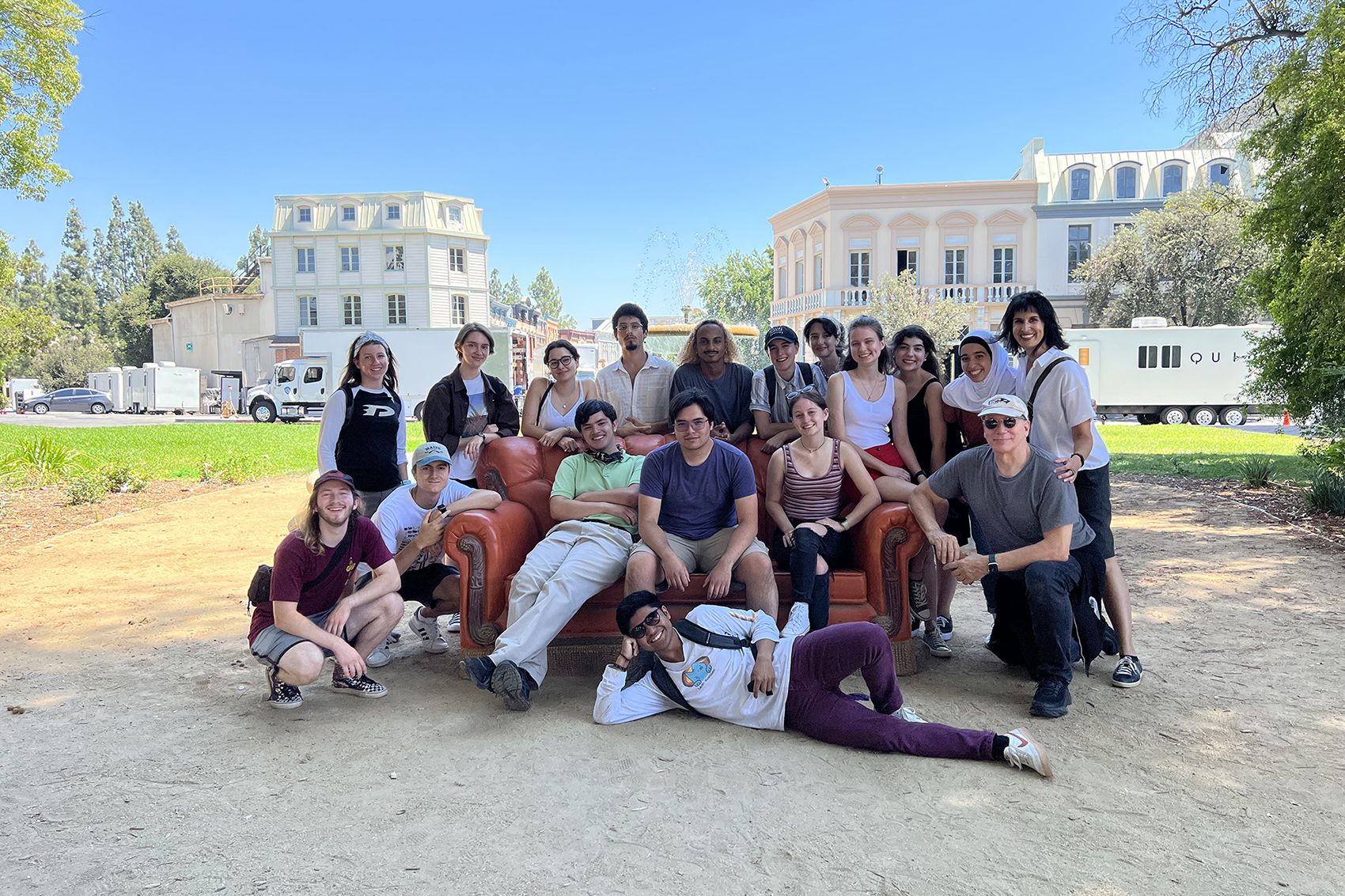 A group of students and faculty pose for a group photo in LA.