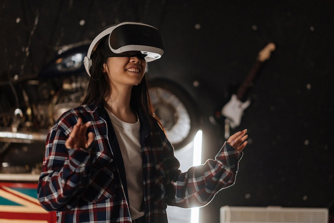 college student wearing a virtual reality headset.