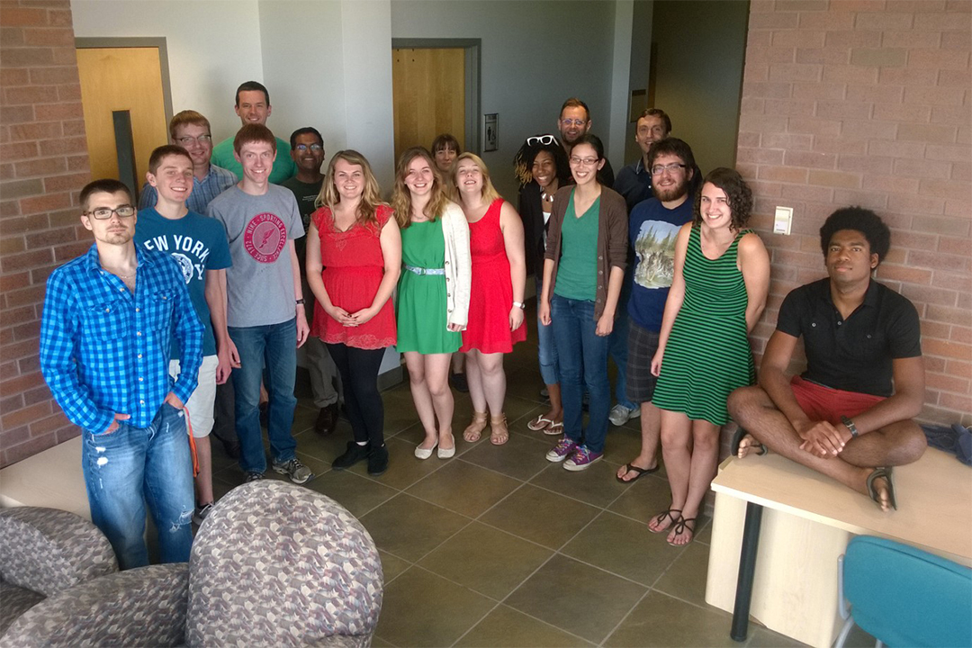 Group of students and faculty pose for photo at the REU site.