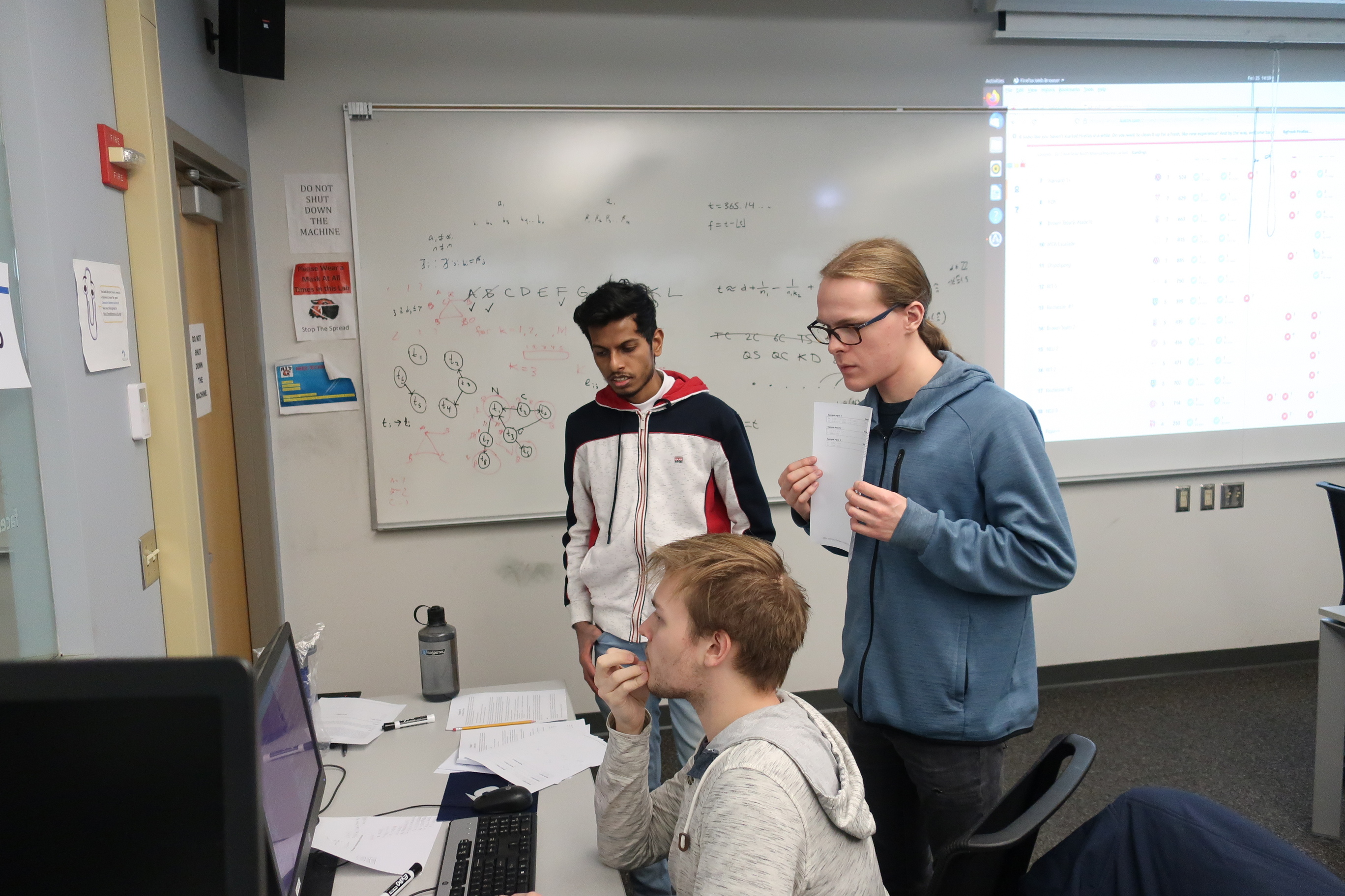 RIT students Mohammed Raeesul Irfan Riaz Ahmed, Eric Karschner, and Quinn Tucker