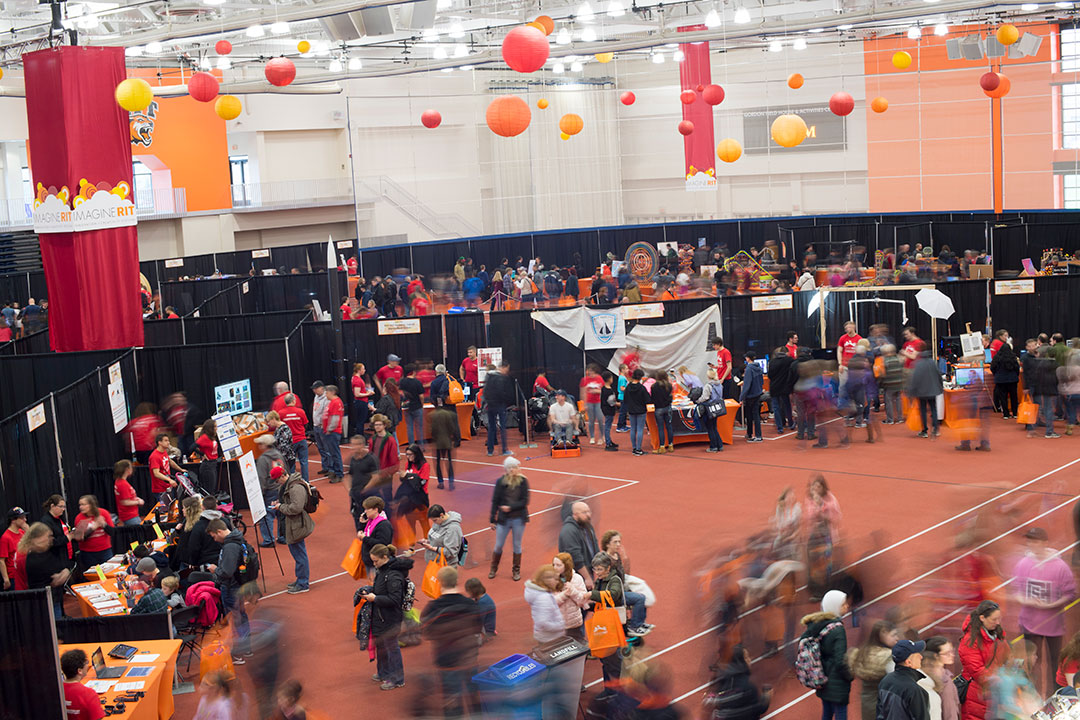 crowd of people at last year's Imagine RIT festival in the field house.