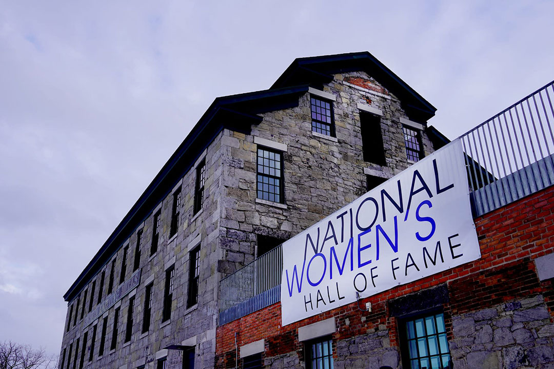 exterior of a stone building with a banner that reads, National Women's Hall of Fame.