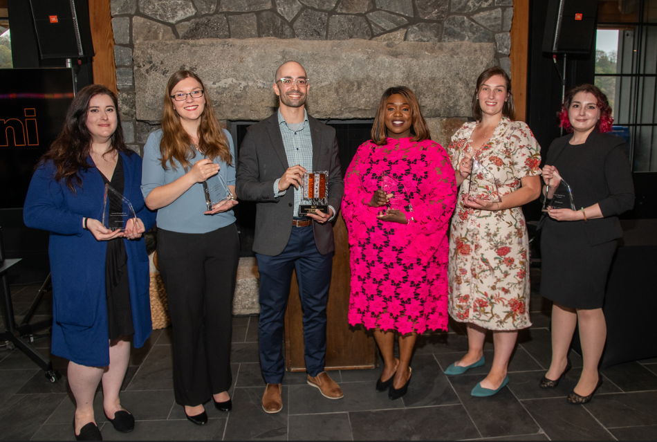 Nine College of Liberal Arts alumni were recognized last week at an award ceremony held at RIT’s Tait Preserve. Pictured from left to right: Cheleen Burke ’14; Brianna Alverson ’16; Luiz Freitas ’07; Krystle Jones-Ellis ’09 , ’15 MS; Melissa Sagen ’15; and Dailyn Clark ’18.