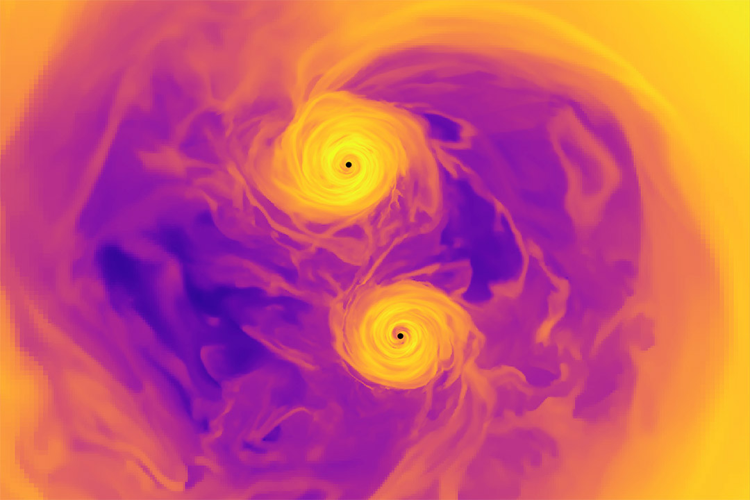 simulation of two supermassive black holes with yellow, orange, and purple swirls.